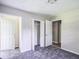 Bedroom featuring neutral walls, carpet flooring and a closet, providing plenty of space at 6770 Burkhead Dr, Union City, GA 30291