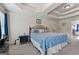 Cozy bedroom featuring tray ceilings, carpet and a decorative wrought iron headboard at 4770 Macy Way, Ellenwood, GA 30294