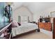 Upstairs bedroom with high ceilings, neutral walls and a view of the backyard at 4770 Macy Way, Ellenwood, GA 30294