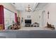 Comfortable living room featuring coffered ceilings, carpet floors, and lots of space for entertaining at 4770 Macy Way, Ellenwood, GA 30294