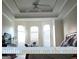 Serene main bedroom with tray ceilings, large windows, and ample natural light at 30 Cynthia Ct, Fayetteville, GA 30215