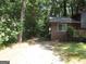 View of a long driveway leading to the home at 4350 Lincolndale Dr, Ellenwood, GA 30294
