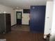 Room with refrigerator and dark colored floor at 4350 Lincolndale Dr, Ellenwood, GA 30294