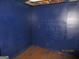 Blue painted walls and light colored floor at 4350 Lincolndale Dr, Ellenwood, GA 30294
