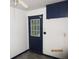 White room with door and light colored floor at 4350 Lincolndale Dr, Ellenwood, GA 30294