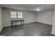 Finished basement with a table and window for natural light at 4852 Pine Shadows, Stone Mountain, GA 30088