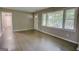 Bright living room with hardwood floors, and lots of natural light at 4852 Pine Shadows, Stone Mountain, GA 30088