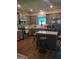 Modern kitchen featuring granite countertops, stainless steel appliances, and a central island with barstool seating at 1945 Labonte Pkwy # 42, Mcdonough, GA 30253