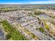 Aerial view of a well-organized residential area with lush greenery and modern facilities nearby at 110 Camford Stone Path, Fayetteville, GA 30214