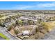 Aerial view highlighting a community near a park featuring an amphitheater and parking at 110 Camford Stone Path, Fayetteville, GA 30214