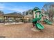 Community playground featuring a picnic area and a green winding slide to enjoy some fun in the sun at 110 Camford Stone Path, Fayetteville, GA 30214