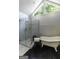 Bright bathroom with double vanity, freestanding tub, and a glass shower at 200 Savannah Walk, Peachtree City, GA 30269