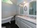 Bright bathroom with double vanity, freestanding tub, and a glass shower at 200 Savannah Walk, Peachtree City, GA 30269