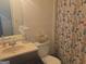 A cozy bathroom with marine theme decor and functional storage solutions at 2071 Scarbrough, Stone Mountain, GA 30088