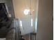 Bright foyer with a chandelier, white door, and partial view of the living room at 2071 Scarbrough, Stone Mountain, GA 30088