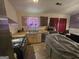 Kitchen featuring stainless steel appliances, wood cabinets, and tiled floors at 2071 Scarbrough, Stone Mountain, GA 30088