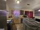 Kitchen featuring stainless steel appliances, wood cabinets, and tiled floors at 2071 Scarbrough, Stone Mountain, GA 30088