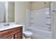 Bright bathroom featuring a sink with vanity and a bathtub-shower combination at 2817 Village Park E Dr, Ellenwood, GA 30294