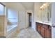 Bathroom with a tub, double vanity, and tile floors at 2817 Village Park E Dr, Ellenwood, GA 30294