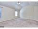Spacious bedroom with large windows, neutral carpet, and vaulted ceilings at 2817 Village Park E Dr, Ellenwood, GA 30294