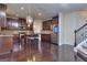 Beautiful kitchen with stainless steel appliances, dark wood cabinets and a spacious center island at 2817 Village Park E Dr, Ellenwood, GA 30294
