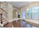 Open floor plan connecting the dining area and living room with lots of natural light at 2817 Village Park E Dr, Ellenwood, GA 30294