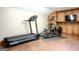 Home gym equipped with modern treadmill and elliptical machine, promoting a healthy and active lifestyle at 360 Darren Dr, Fayetteville, GA 30215