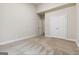 Bedroom with doors, neutral walls, and plush carpeting ready for personalization at 416 Fairway Dr, Acworth, GA 30101