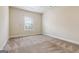 Neutral bedroom showcasing natural light, and plush carpeting at 416 Fairway Dr, Acworth, GA 30101