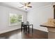 Inviting dining area with hardwood floors, natural light, and neutral paint at 416 Fairway Dr, Acworth, GA 30101