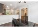 Bright dining area featuring hardwood floors and seamless flow to the kitchen and living spaces at 416 Fairway Dr, Acworth, GA 30101