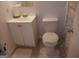 A bathroom with a sink, toilet, and patterned shower curtain at 3248 Brisbane Way, Lithonia, GA 30038
