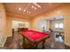 Finished basement with pool table, bar area, and neutral paint and flooring at 4311 Hampton Mill Pkwy, Douglasville, GA 30135