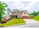 Charming two-story home with brick and siding, showcasing a well-kept lawn and inviting curb appeal at 4311 Hampton Mill Pkwy, Douglasville, GA 30135