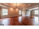 Bright living room with hardwood floors, tray ceilings, and ample natural light at 4311 Hampton Mill Pkwy, Douglasville, GA 30135