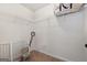 Walk-in closet with wire shelving, neutral carpet, and ample storage space at 470 Louise Way, Locust Grove, GA 30248