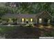 Charming single-story home featuring a stone facade, inviting front porch and nicely landscaped front yard at 380 Peach Drive, Mcdonough, GA 30253