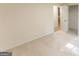 Spacious bedroom with new carpet, an open closet, and neutral paint at 115 Brookwood Ln, Fayetteville, GA 30215