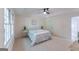 Comfortable main bedroom featuring a large window for natural light, creating a relaxing atmosphere at 115 Brookwood Ln, Fayetteville, GA 30215