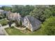 Aerial view of beautiful home with mature landscaping and trees at 1360 Mount Mckinley Dr, Grayson, GA 30017
