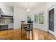 Charming breakfast nook with wood floors, a view to the outside, and natural light at 1360 Mount Mckinley Dr, Grayson, GA 30017