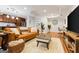 Cozy living room with wood floors, rug, comfortable seating and a large TV at 1360 Mount Mckinley Dr, Grayson, GA 30017