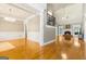 Open-concept living room featuring hardwood floors, fireplace and lots of natural light at 1360 Mount Mckinley Dr, Grayson, GA 30017