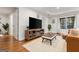 Open floor plan in a living room with wood floors and comfortable seating at 1360 Mount Mckinley Dr, Grayson, GA 30017