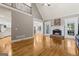 Spacious living room with fireplace and view to kitchen, dining area, and second story at 1360 Mount Mckinley Dr, Grayson, GA 30017