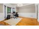 Bright home office with large window, hardwood floors, and neutral decor at 1360 Mount Mckinley Dr, Grayson, GA 30017