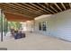 Covered outdoor patio on lower level, perfect for entertaining and outdoor dining at 1360 Mount Mckinley Dr, Grayson, GA 30017