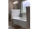 Bright bathroom featuring a corner tub with decorative tile surround and frosted window at 160 Elysian Dr, Fayetteville, GA 30214