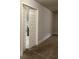 A bedroom showcasing doors leading to another room in the house at 160 Elysian Dr, Fayetteville, GA 30214