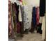 Walk-in closet with hanging clothing and shelves for excellent organization at 160 Elysian Dr, Fayetteville, GA 30214